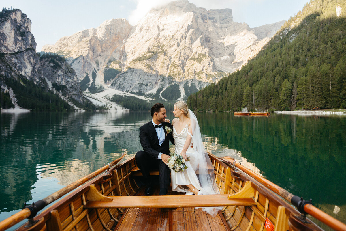 Couple on a boat eloping at Lago di Braies