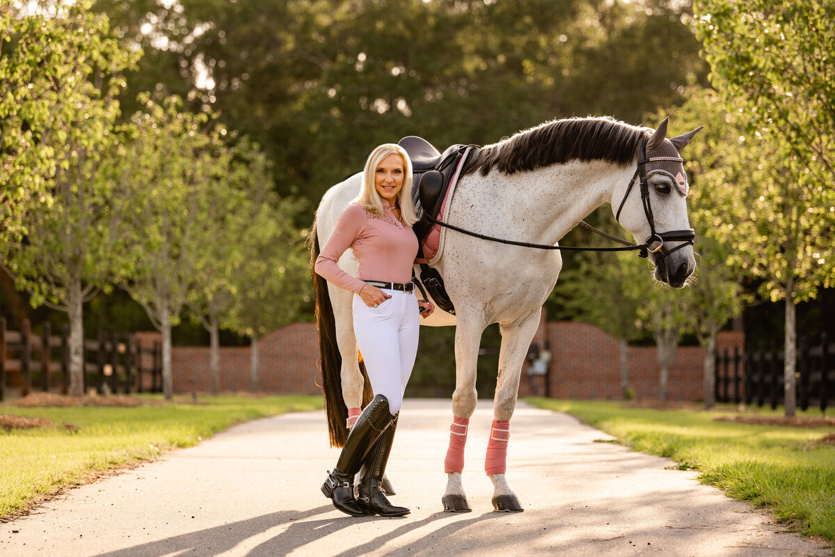Woman and her dressage horse photographed near Tallahassee, FL at their home farm.