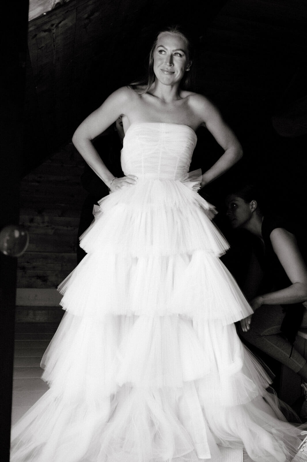 Black and white photo of the bride wearing her wedding dress at The Ausable Club, New York.