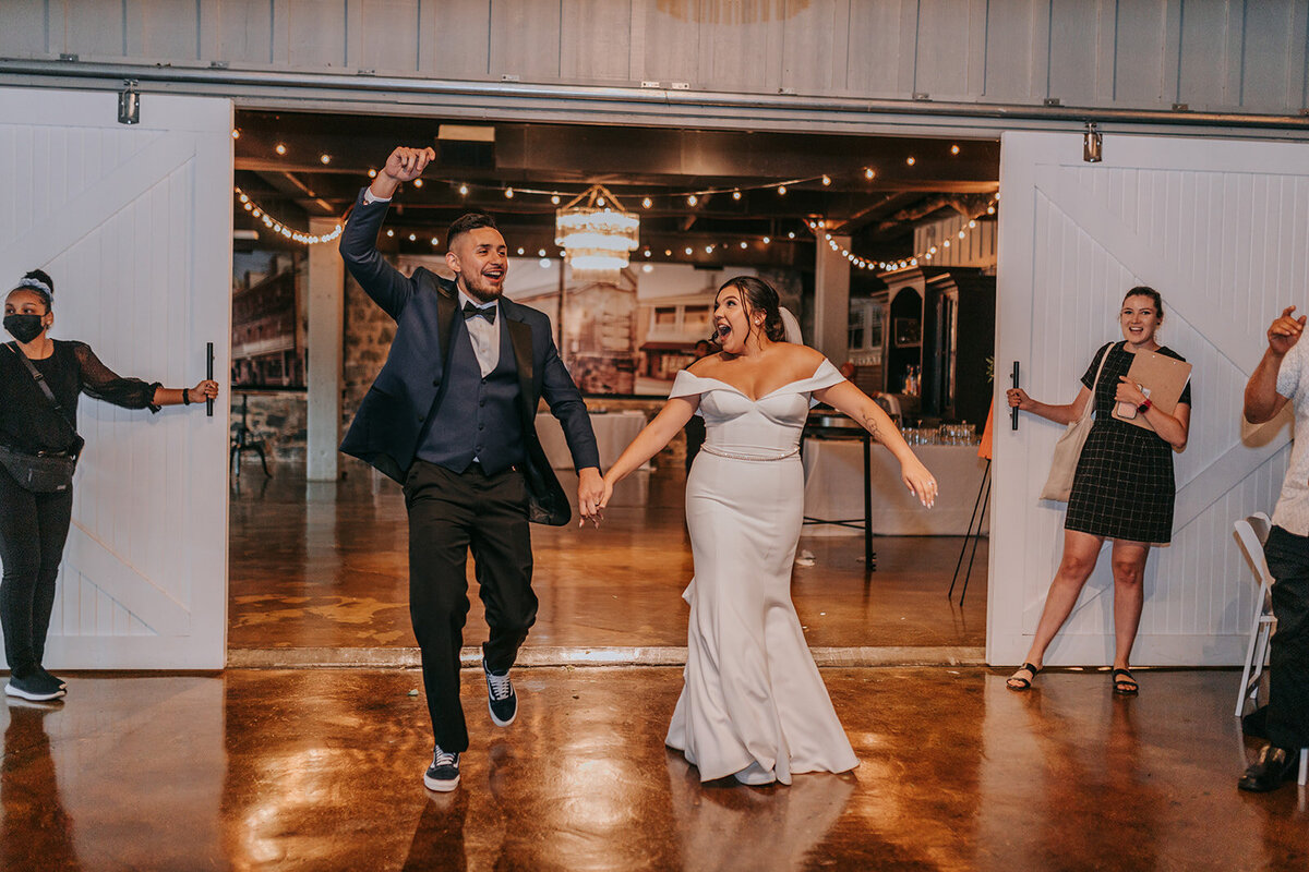 Bride and groom dancing in the dance floor