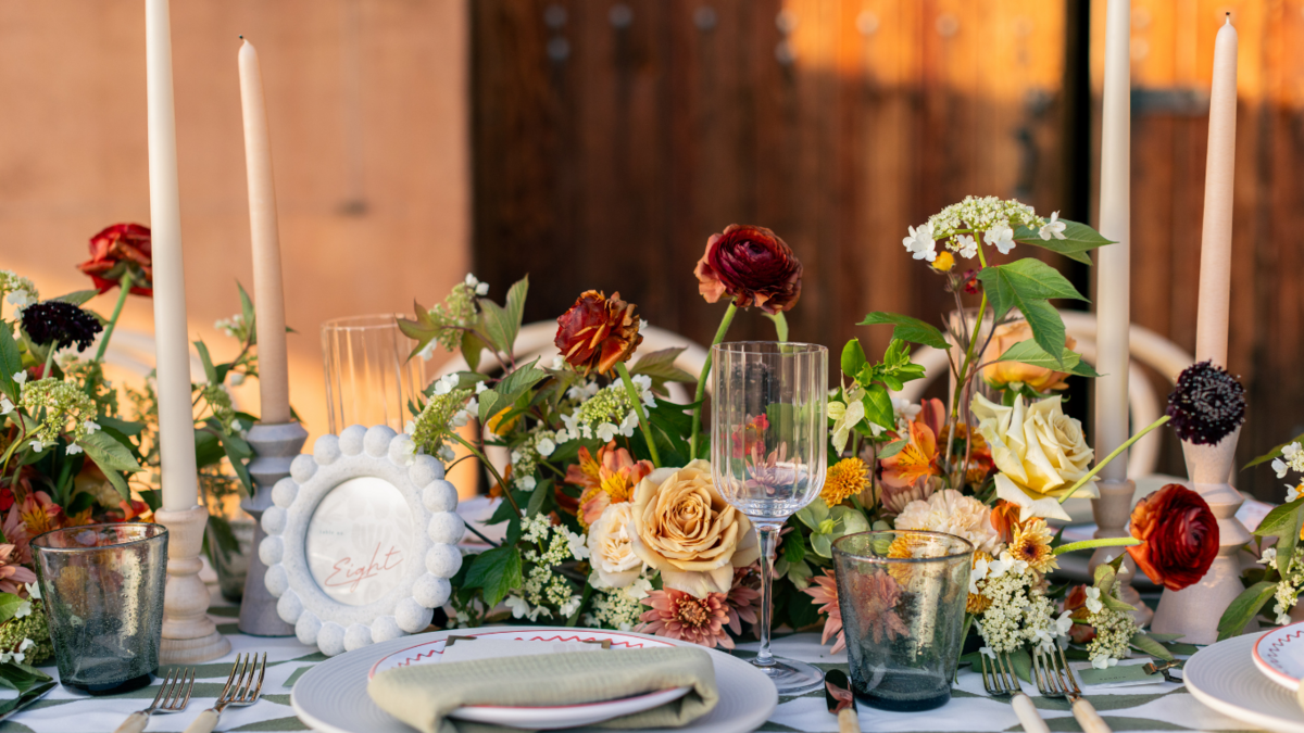 Vintage-inspired place settings with fine china and elegant silverware for a romantic touch.