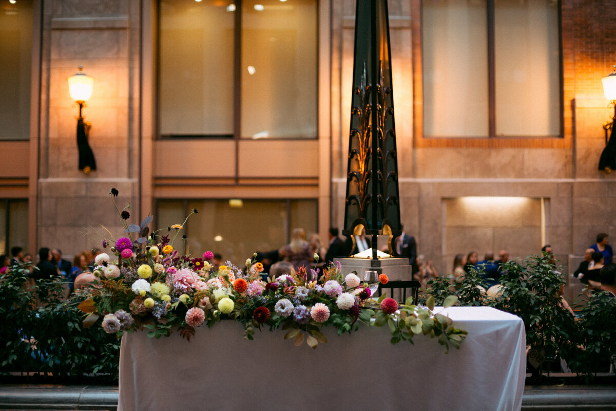 Colourful, bright, sweetheart flowers for a wedding reception at Ruelle des Fortifications.