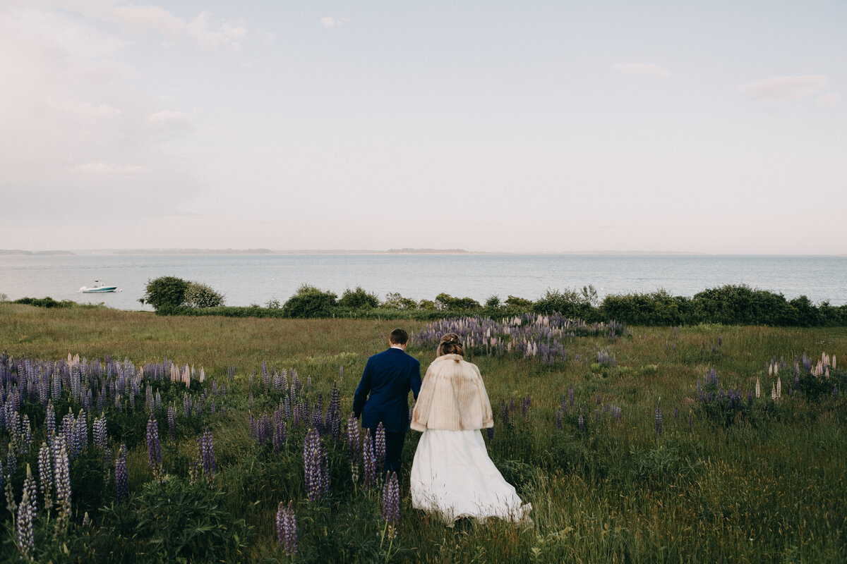 New England couple walking in a lavender field