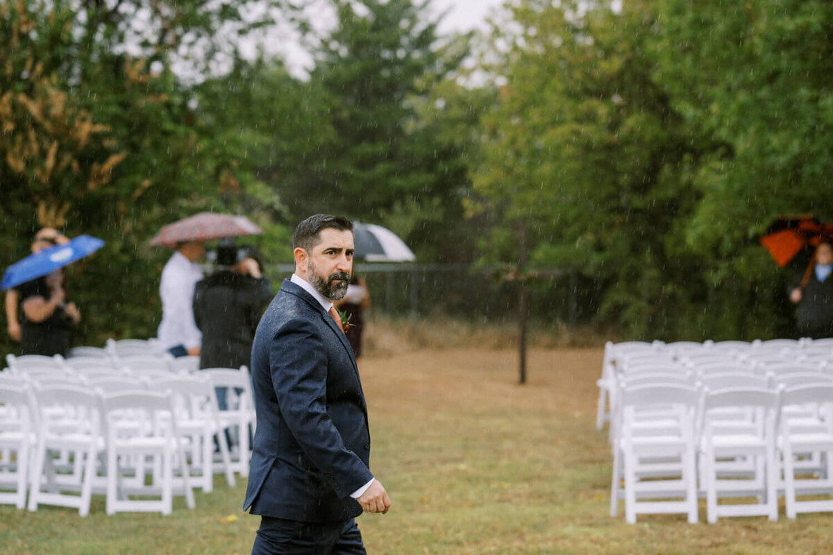 groom-in-the-rain