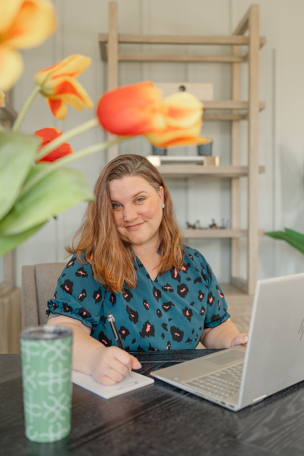 photo of a business owner while working taken by a Northern Virginia branding photographer