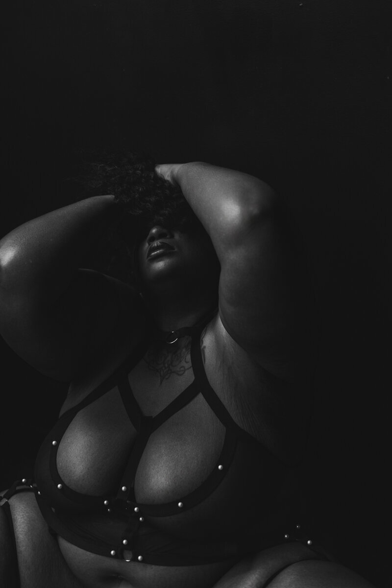 artistic black and white image of curvy black woman