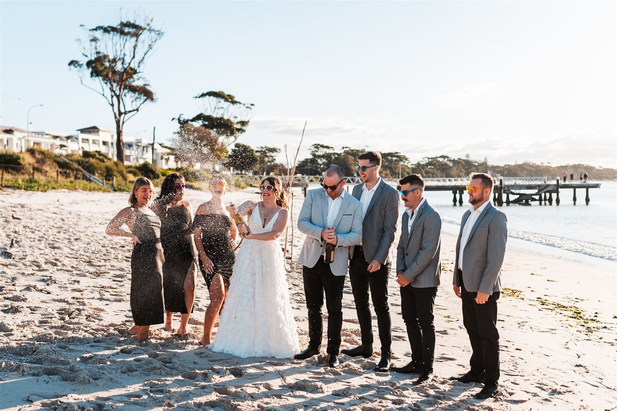 Hannah & Cory having a phot shoot together with their bridesmaids and groomsmen