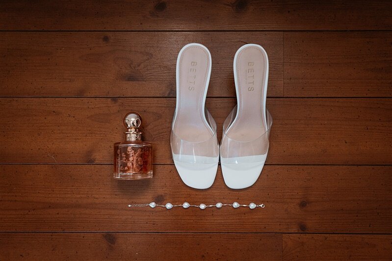 Step into elegance on your special day with our exquisite collection of bridal shoes and fragrances.