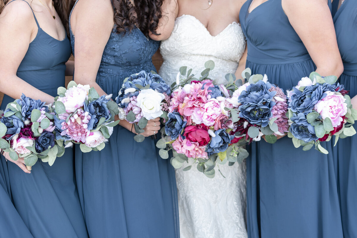 Bridesmaids holding their bouquets