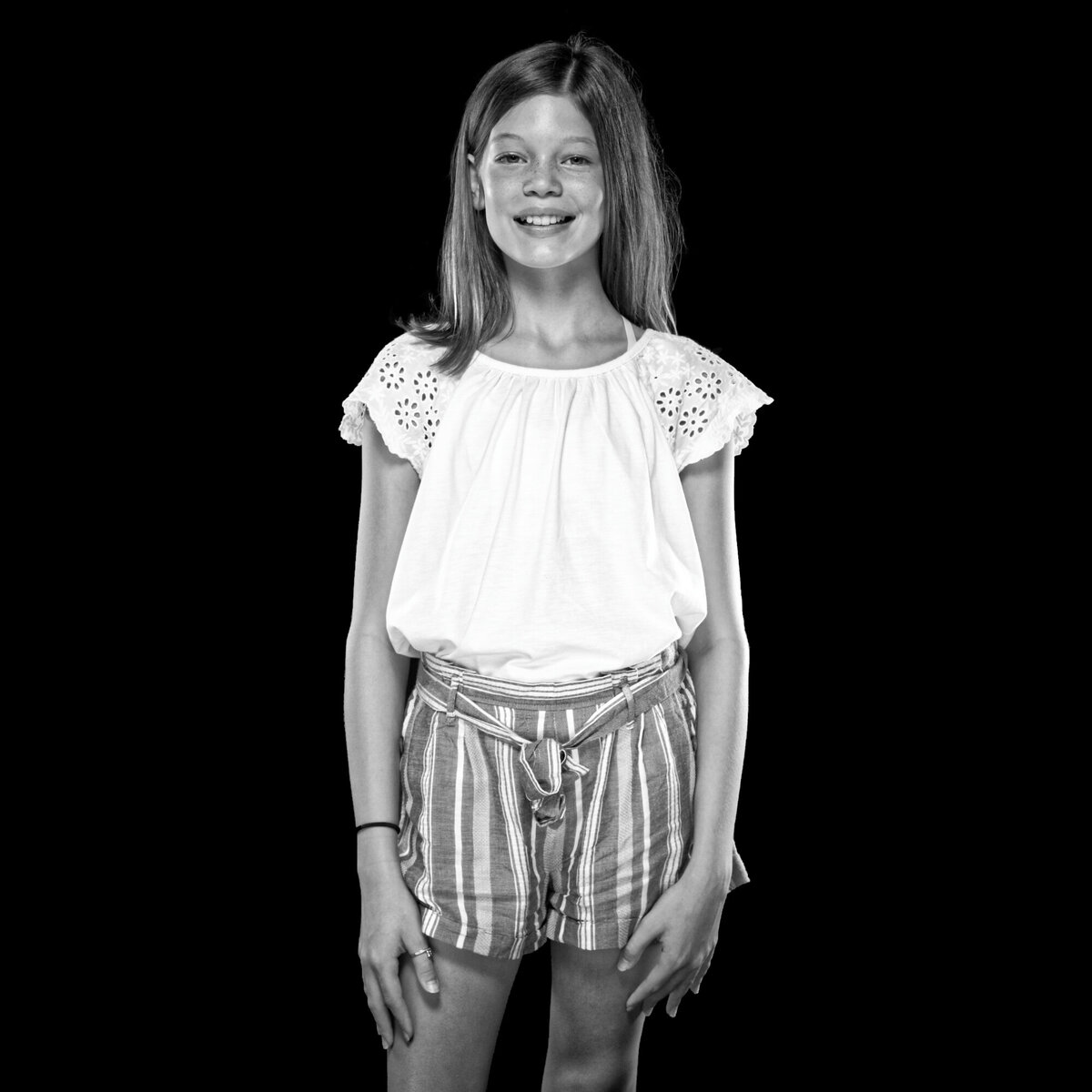 girl standing black white portrait