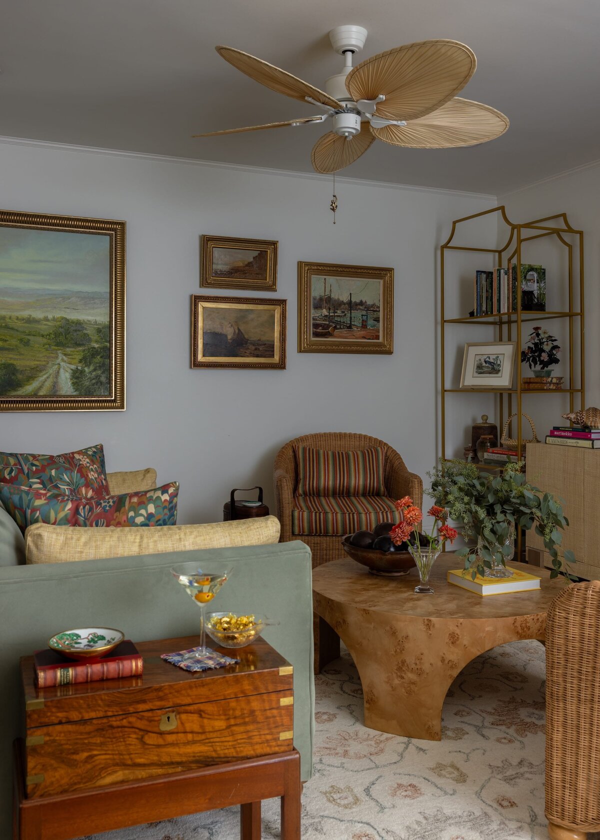 melinda chesson interiors poindexter living room with gold framed painting on wall