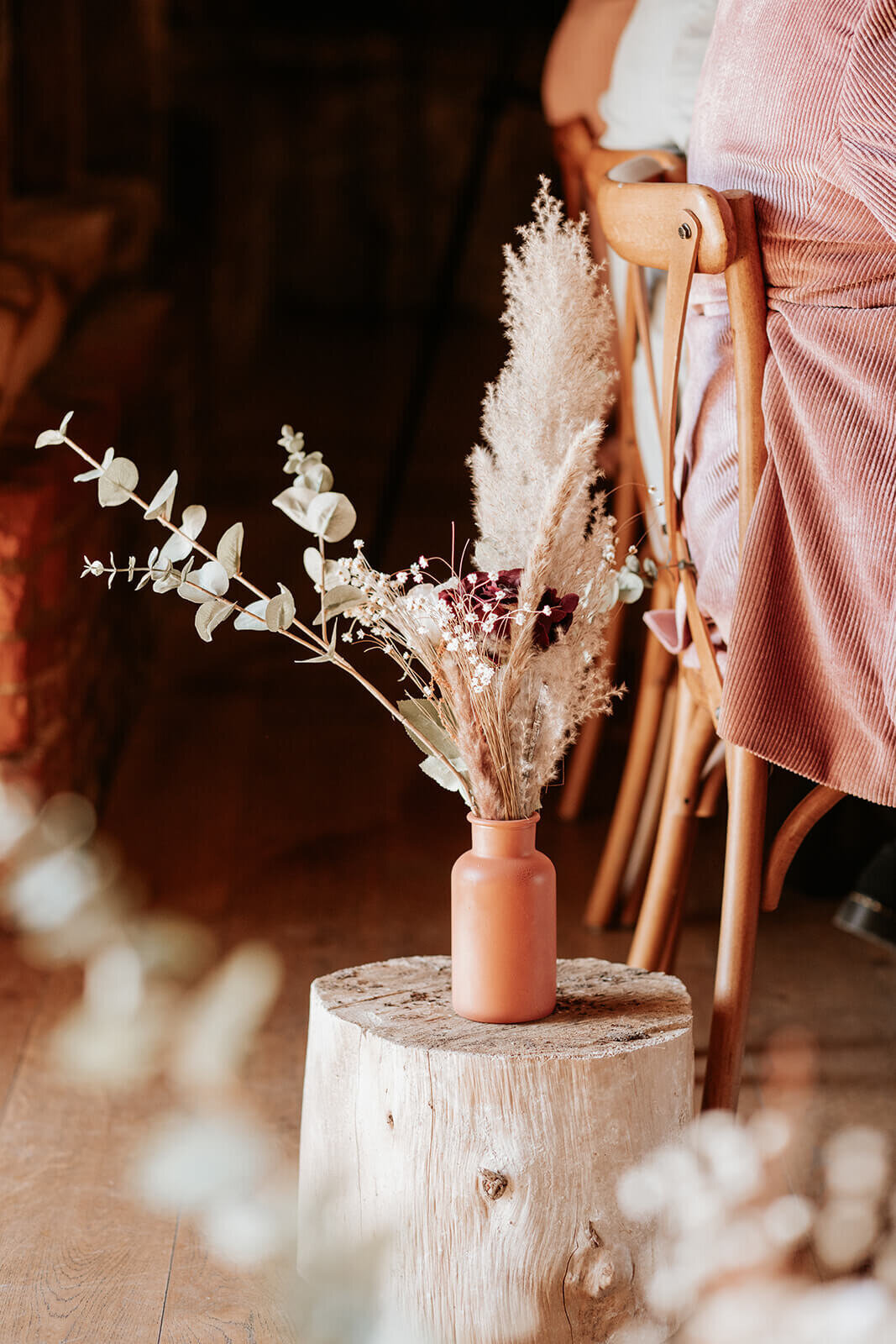 Sarah and Sam Aisle flowers. Photo by Nataly J Photography