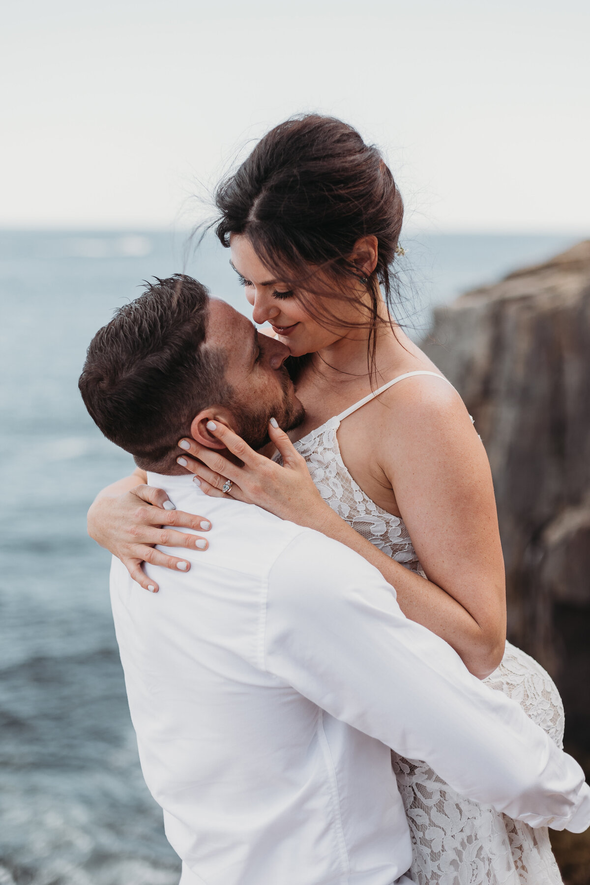 bride and groom embracing