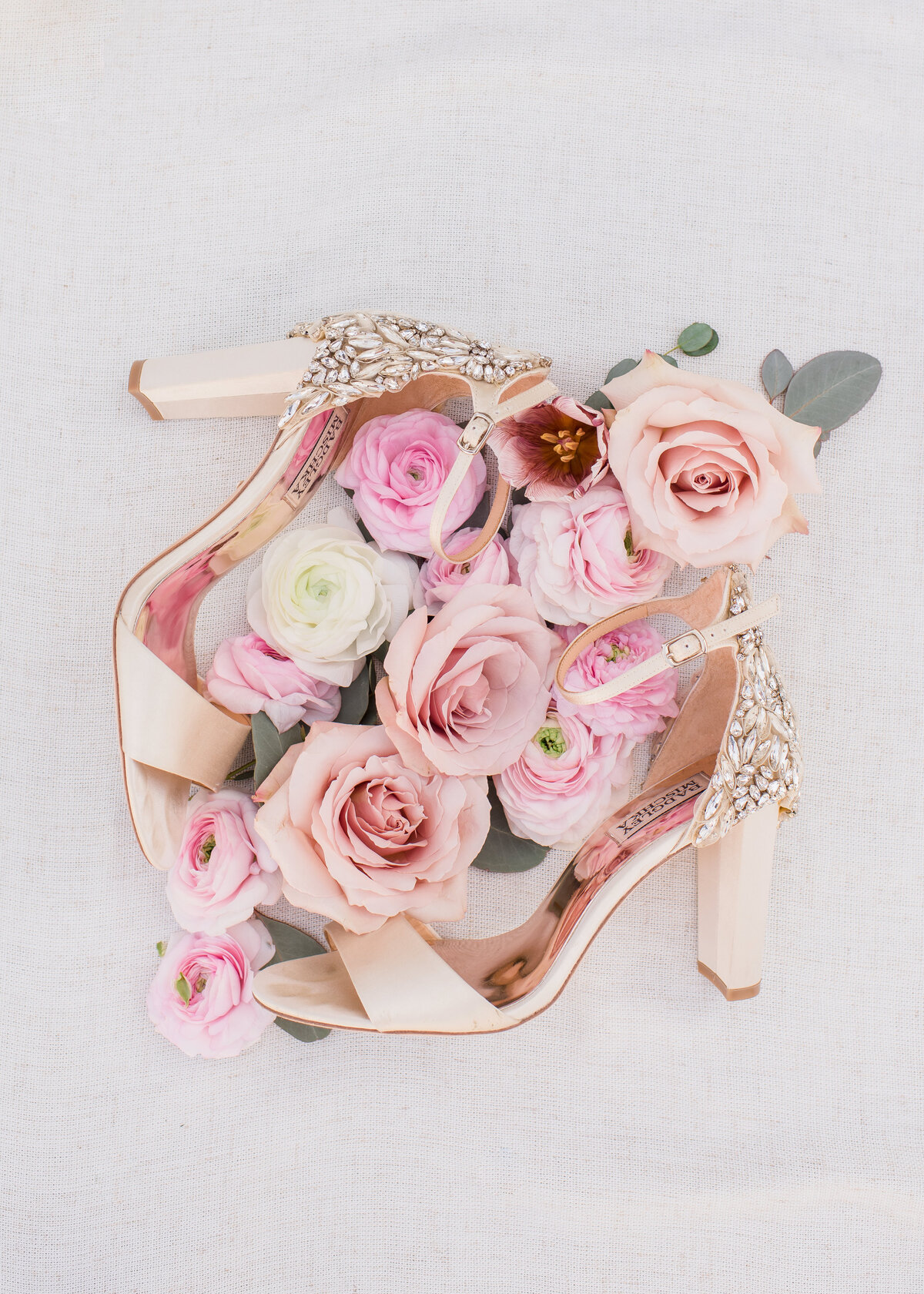 wedding-shoes-surrounded-by-flowers