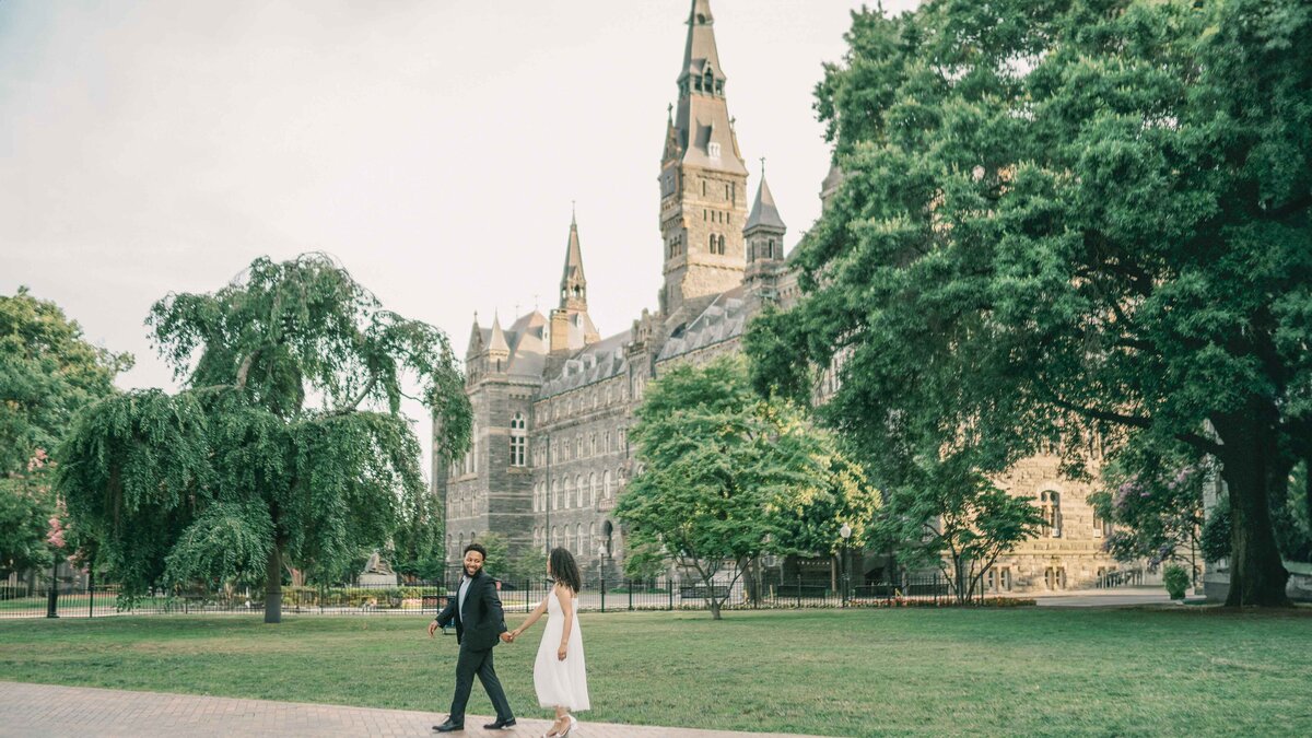 couple walking in front of the Georgetown University in Washington D.C.