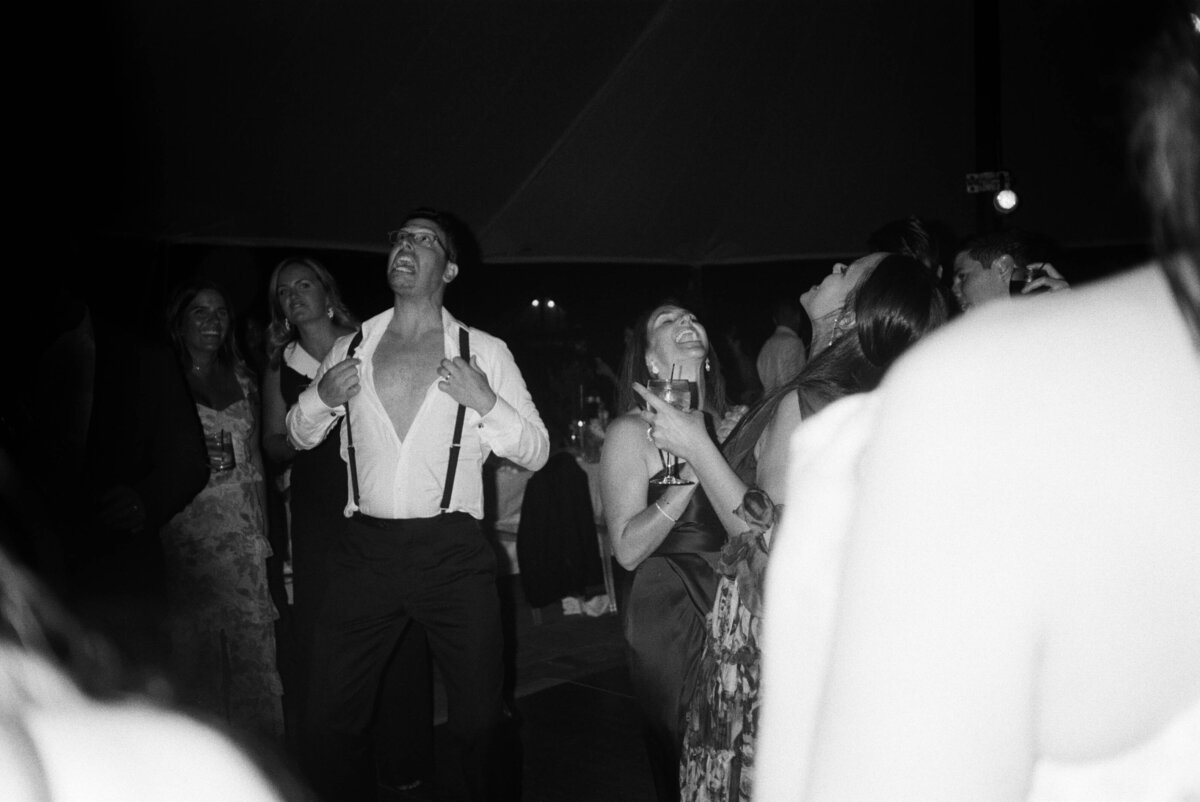 Guests dancing during a wedding at Hasbrouck House in Stone Ridge, NY.


