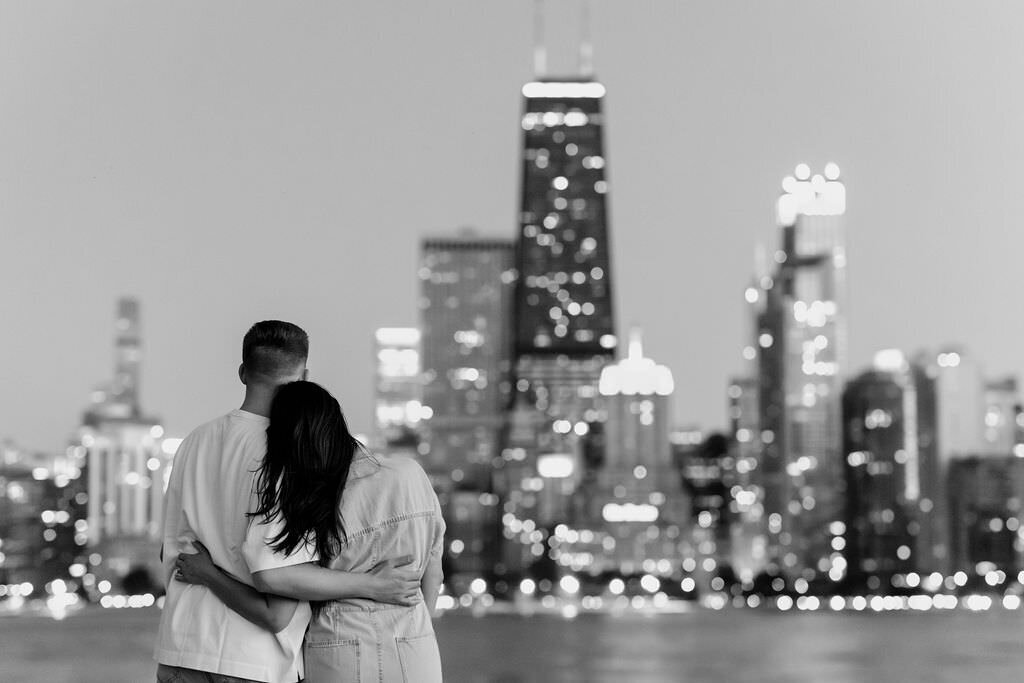 An engagement photography session at The Wrigley Building and North Ave Beach in Chicago, Illinois - 44