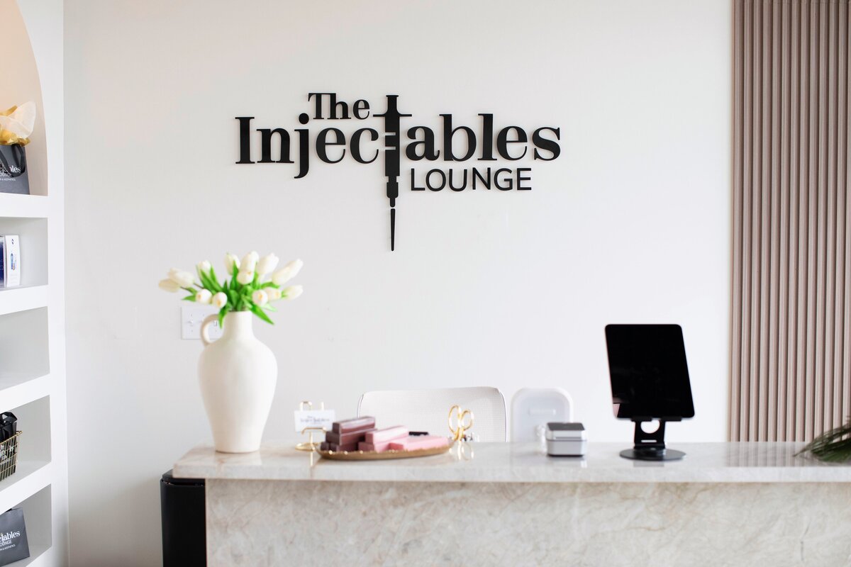 Clean, professional medical spa treatment room with neutral tones at The Injectables Lounge - Pendleton in Indianapolis