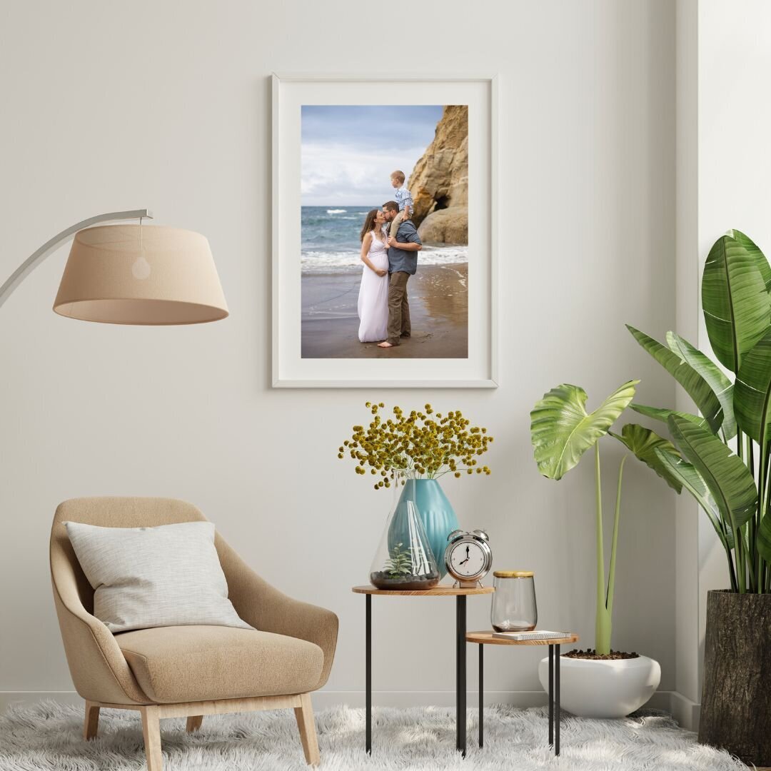 Large matted frame of pregnant mom and family at the beach.