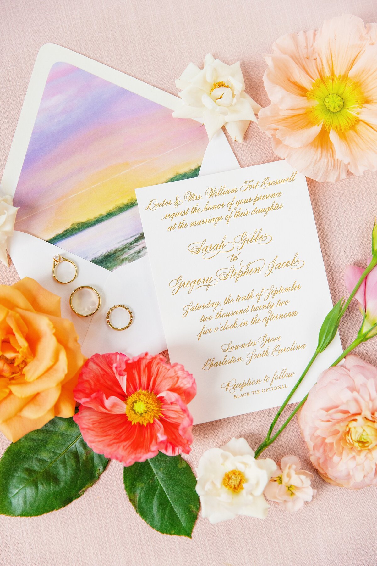bright wedding stationery suite with sunset painted envelope liner