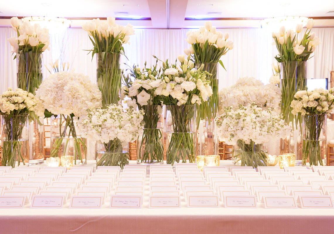 Luxury white florals on escort card display