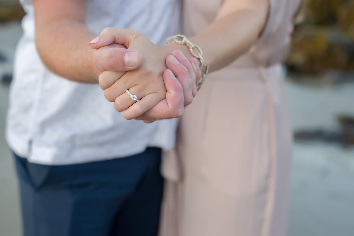 Engaged Couple Holding Hands
