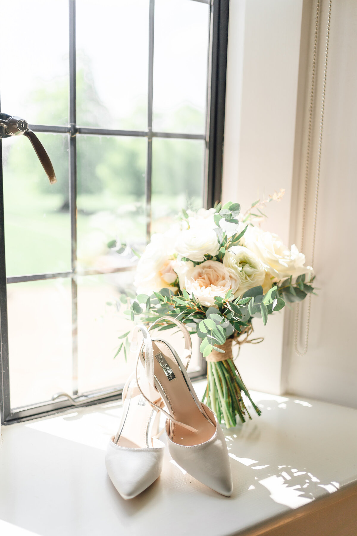 Wedding flowers and shoes at Colshaw Hall