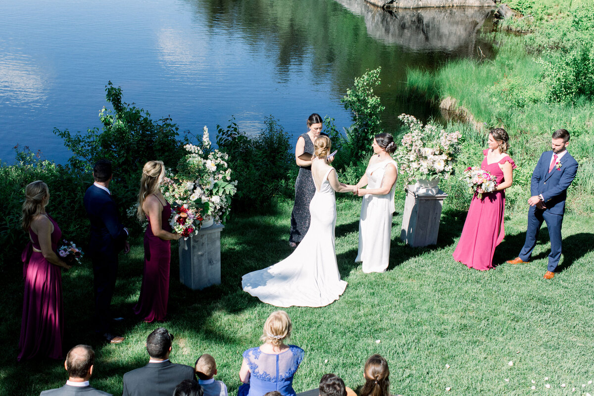 wedding ceremony by the lake at Lakefalls Lodge in Munsonville, New Hampshire