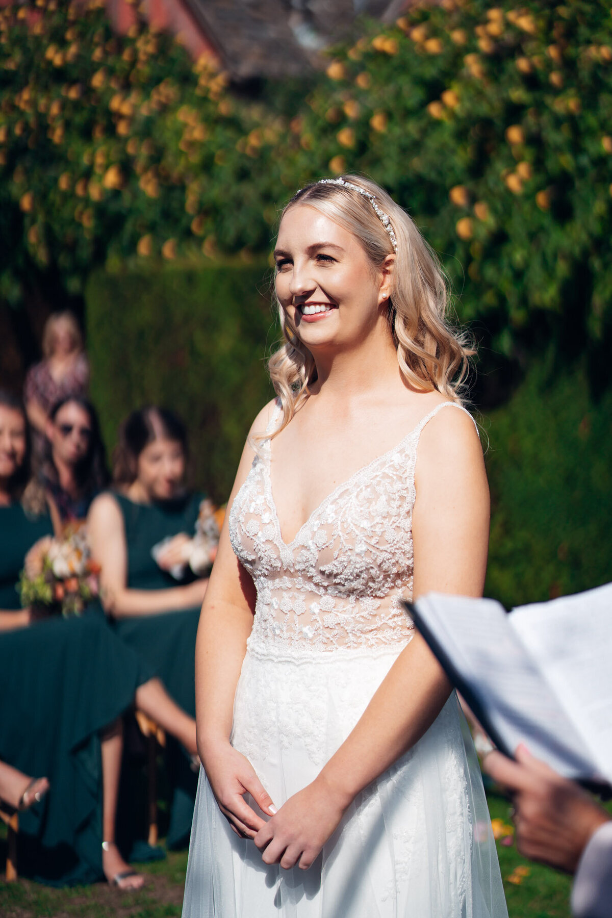 Pauntley-court-wedding-photographer-bride-during-outdoor-ceremony