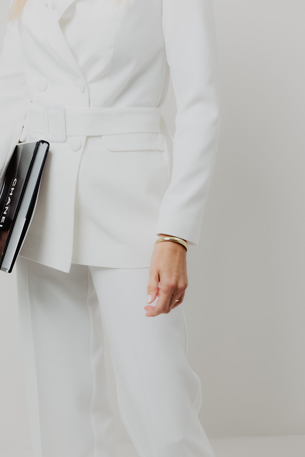 luxury white outfit with fold jewelry