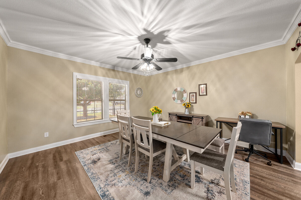 Spacious dining room area in this five-bedroom, 4-bathroom pet-friendly vacation rental house for 12 guests with free wifi, free parking, hot tub, mother-in-law suite, King beds and updated kitchen in downtown Waco, TX.