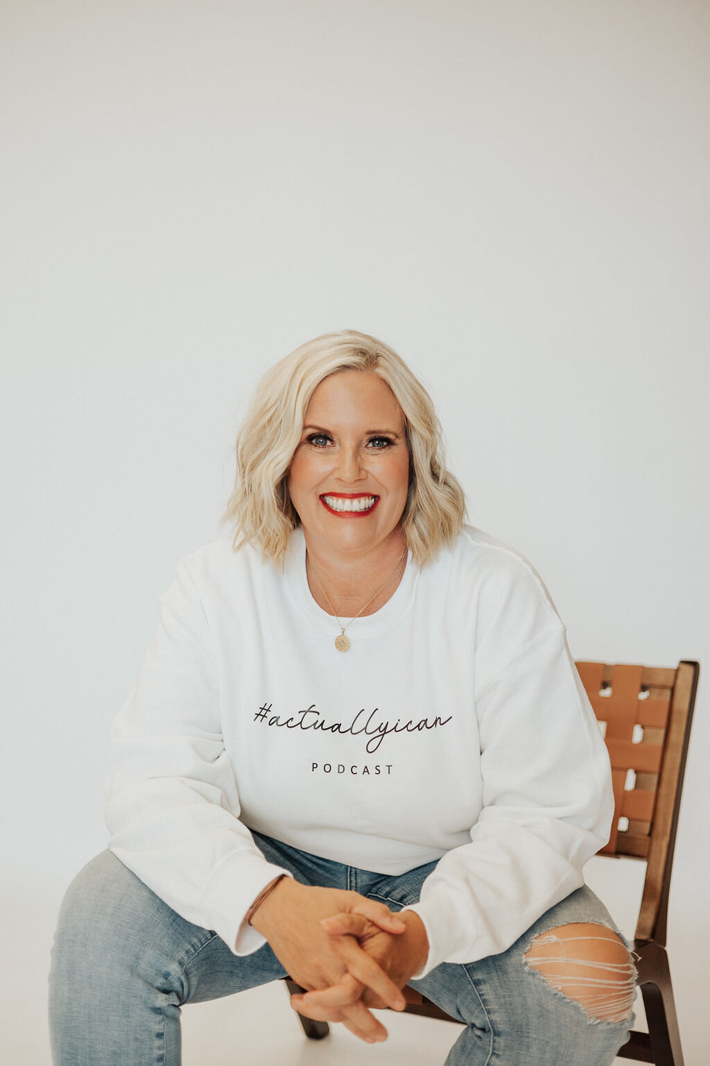 Katy Ripp Wearing #ActuallyICan podcast sweatshirt