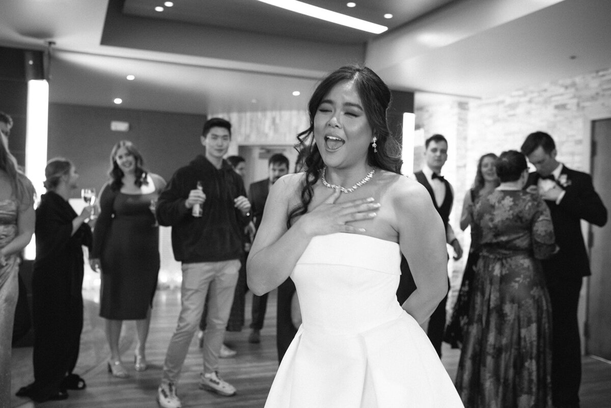 Bride getting ready for her Denver wedding, captured in a candid moment by a documentary wedding photographer.