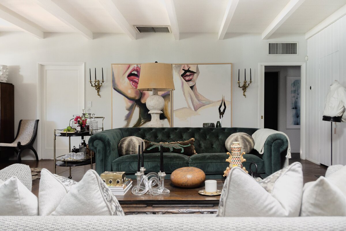 Oxford living room with evocative art and velvet couch
