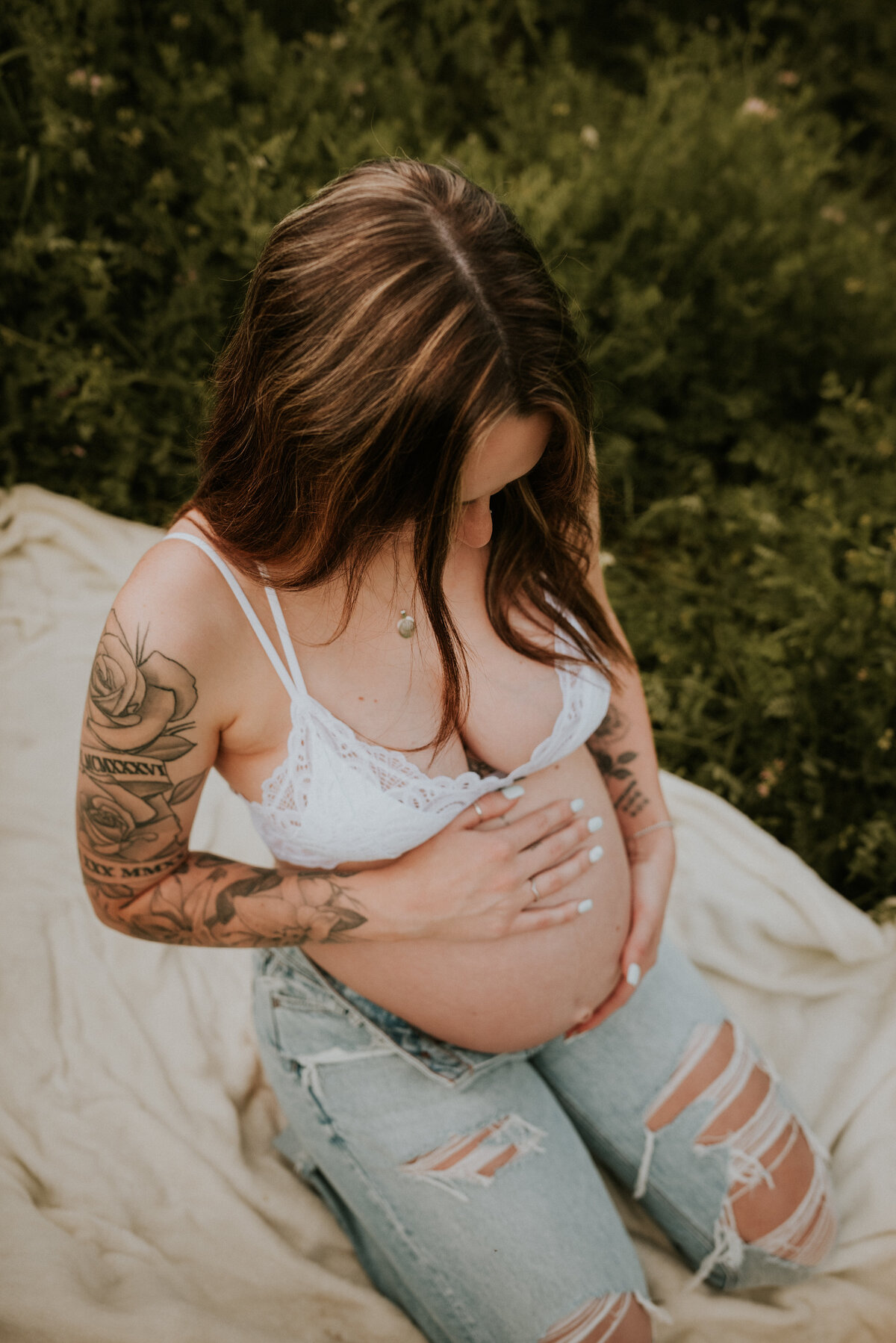 Experience outdoor maternity photography in the picturesque locations of Twin Cities, MN. Ideal for mothers-to-be wanting to embrace nature's beauty in their portraits.