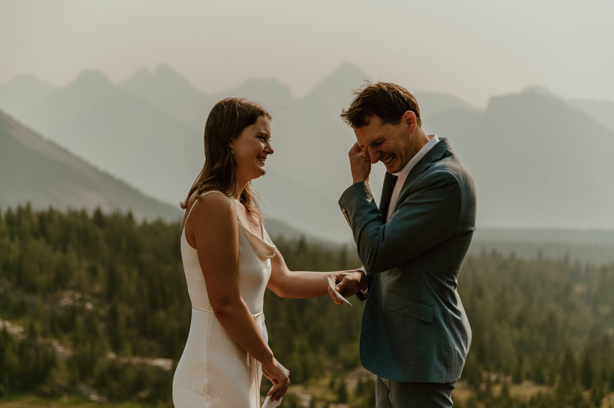 emotional ceremony moment during mountain elopement