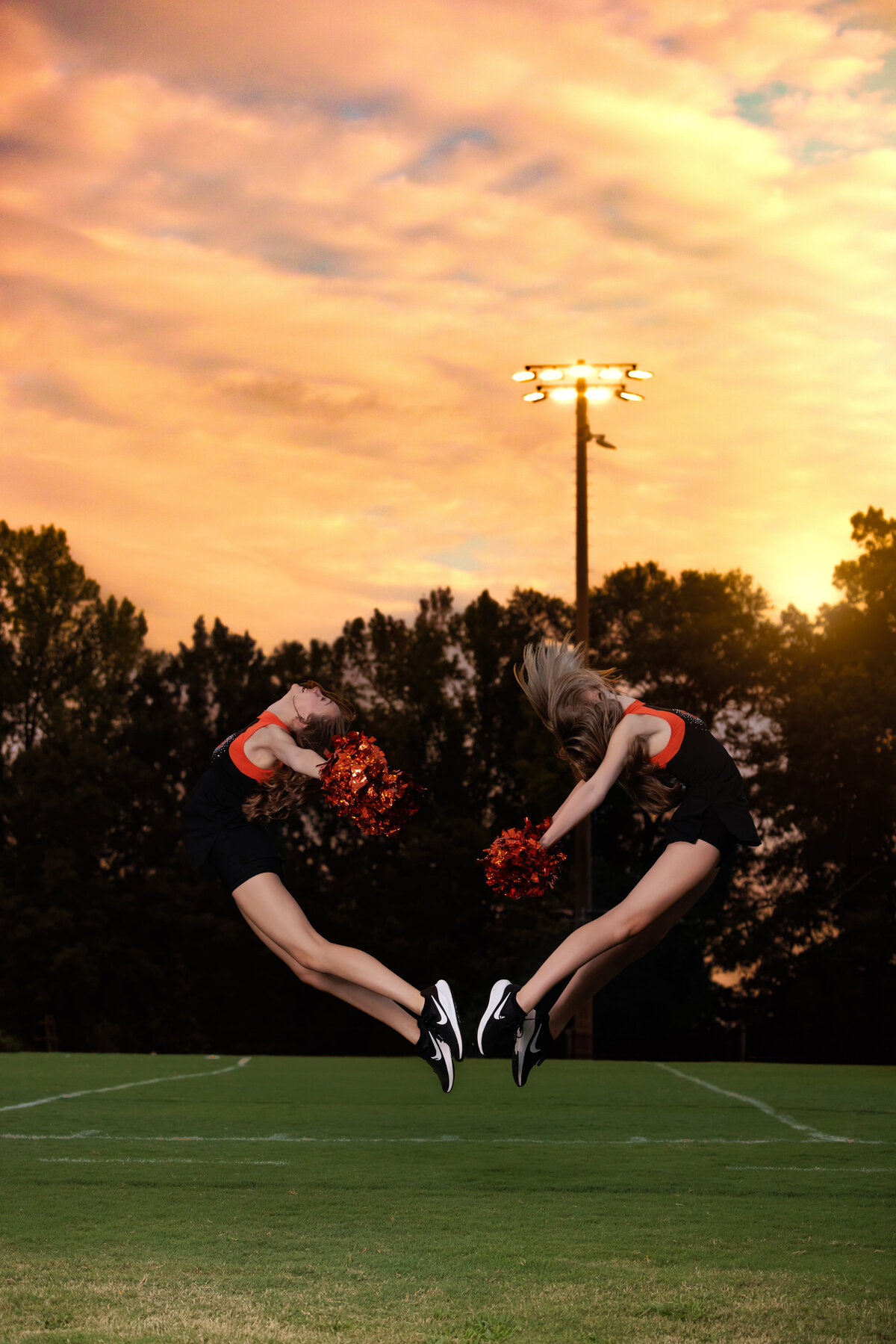 FVHS Dance Team Jump into a heart in Fuquay Varina