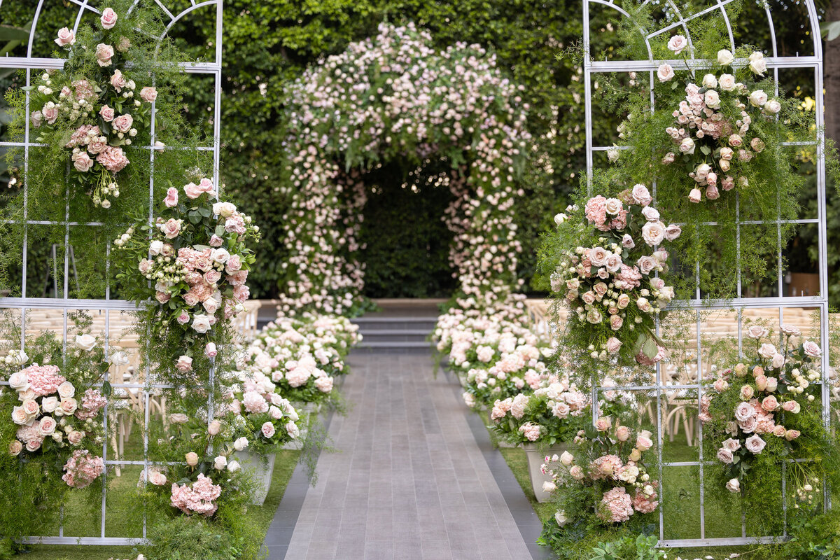 An empty wedding ceremony site covered in flowers