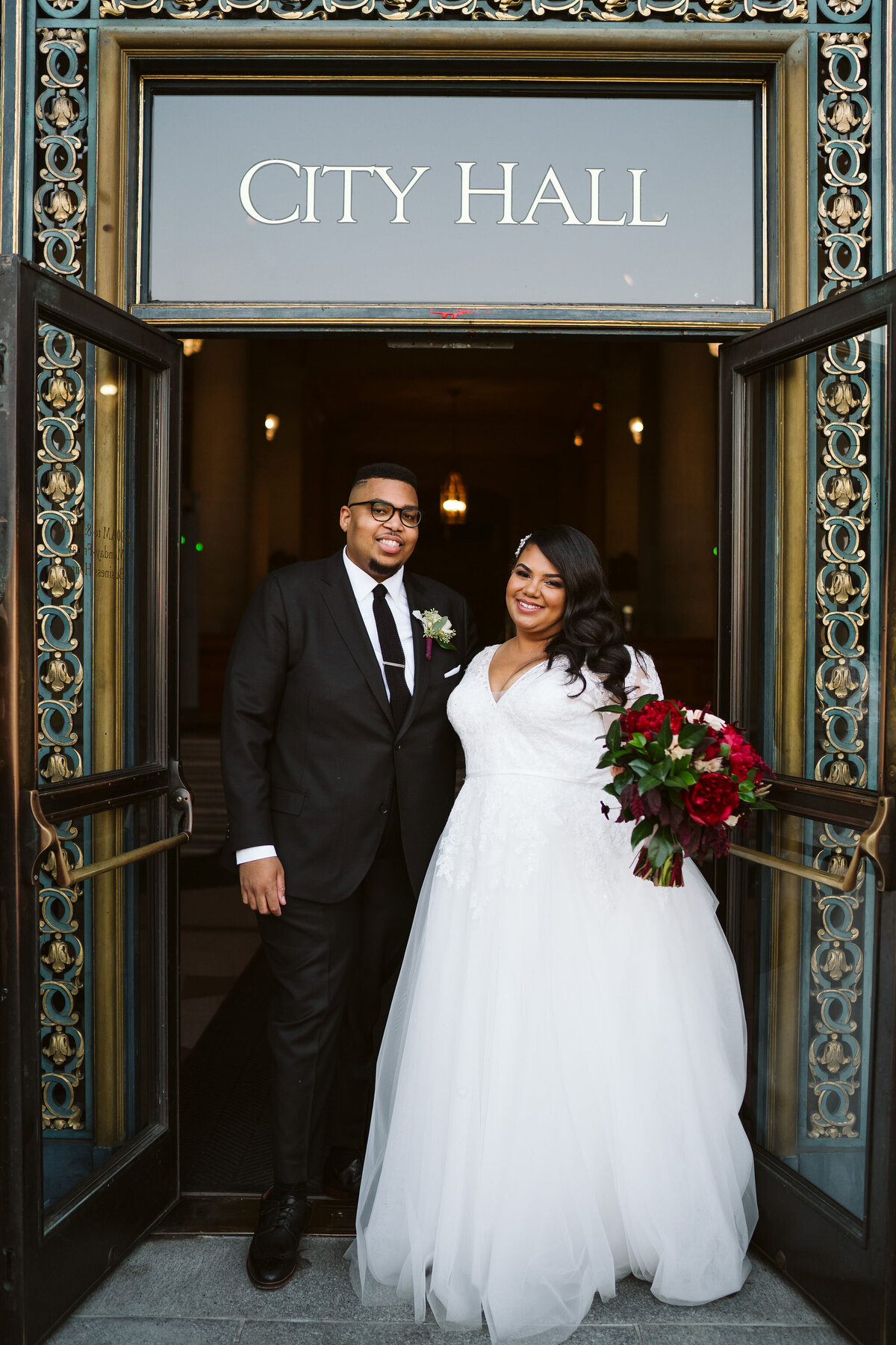 san francisco city hall bride and groom portrait