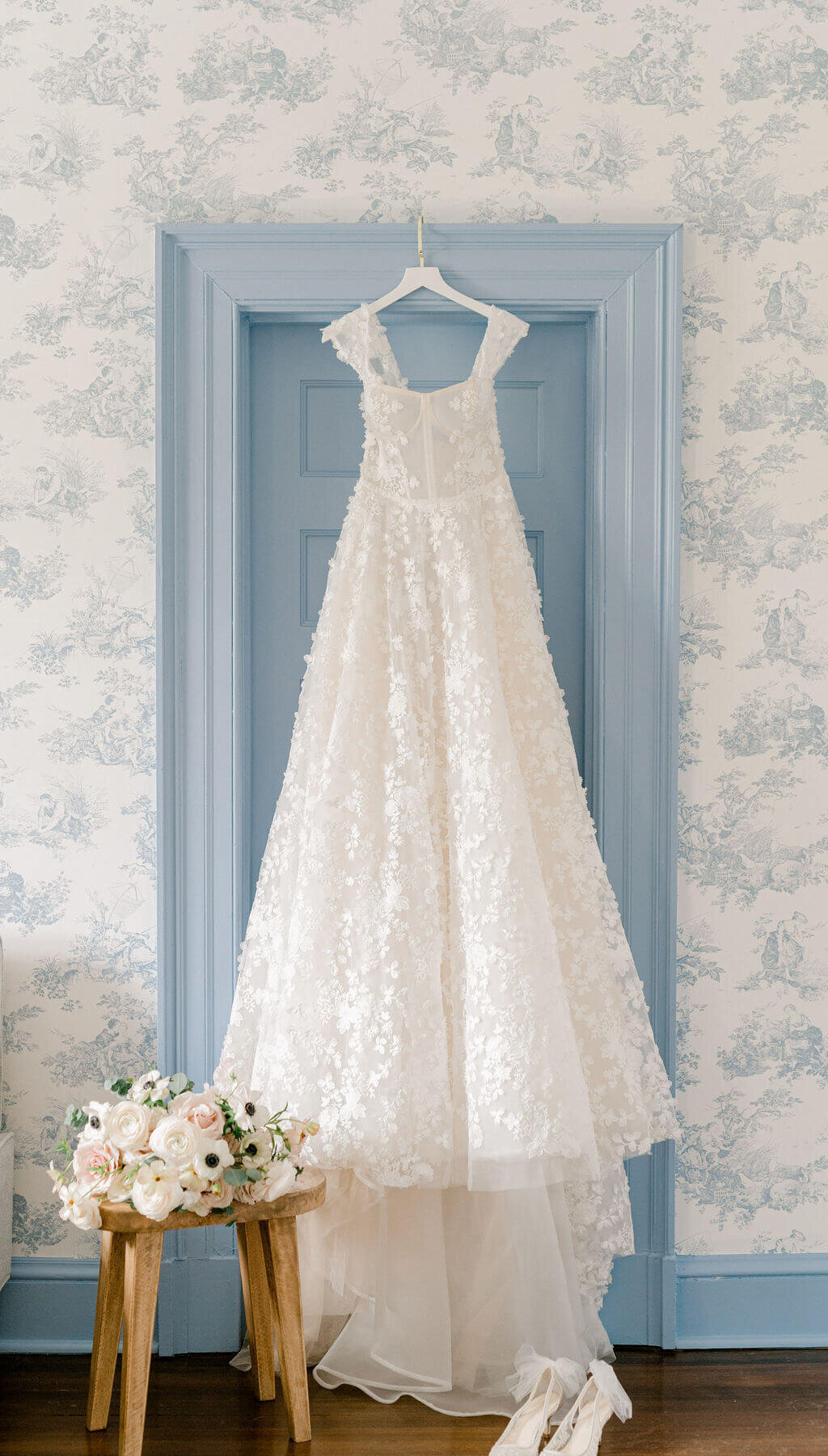 Eisen Stein Bridal gown hanging in Toile bridal suite