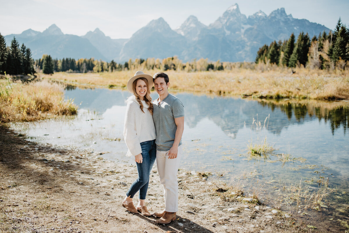 Photographers Jackson Hole capture couple portrats in front of lake