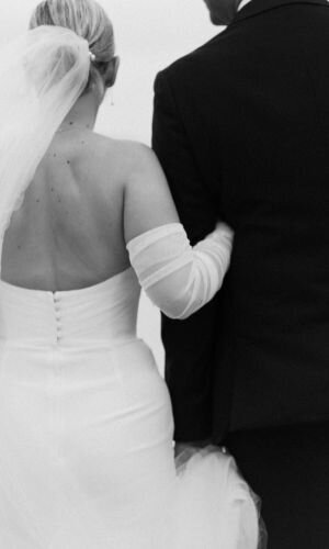 Back view of a bride and groom at a Miami wedding captured by Claudia Amalia Photography, a top Miami wedding photographer