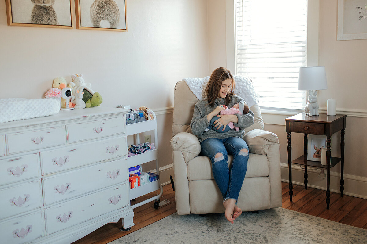 mommy rocking newborn baby | Nicola Herring Photography