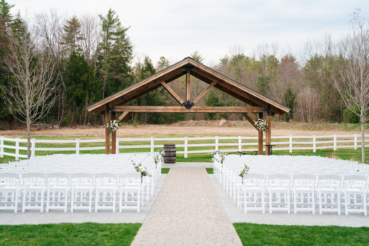 Rustic wedding details with greenery and neutral tones