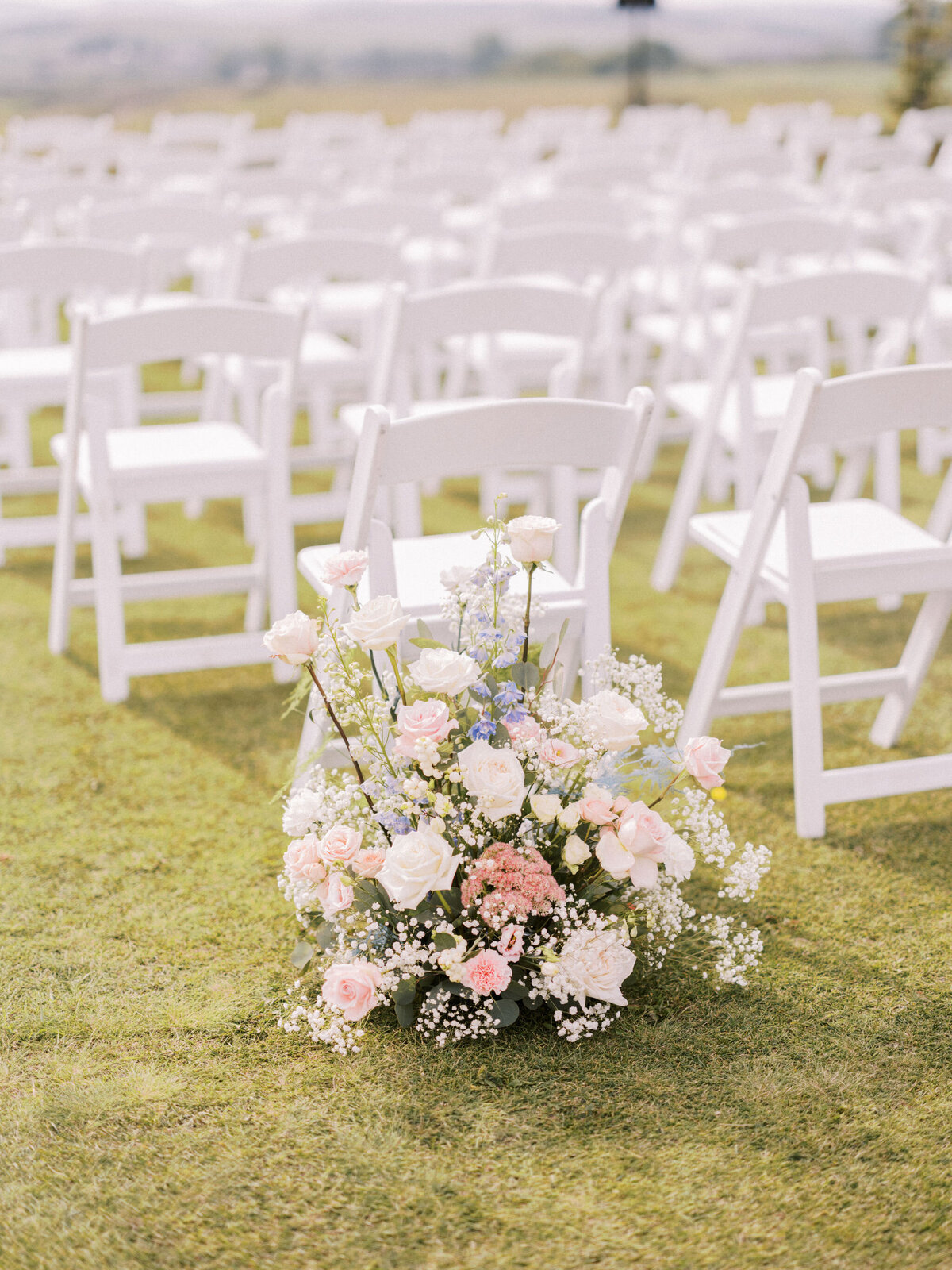 wedding-ceremony-ground-floral-arrangement-roses-calgary