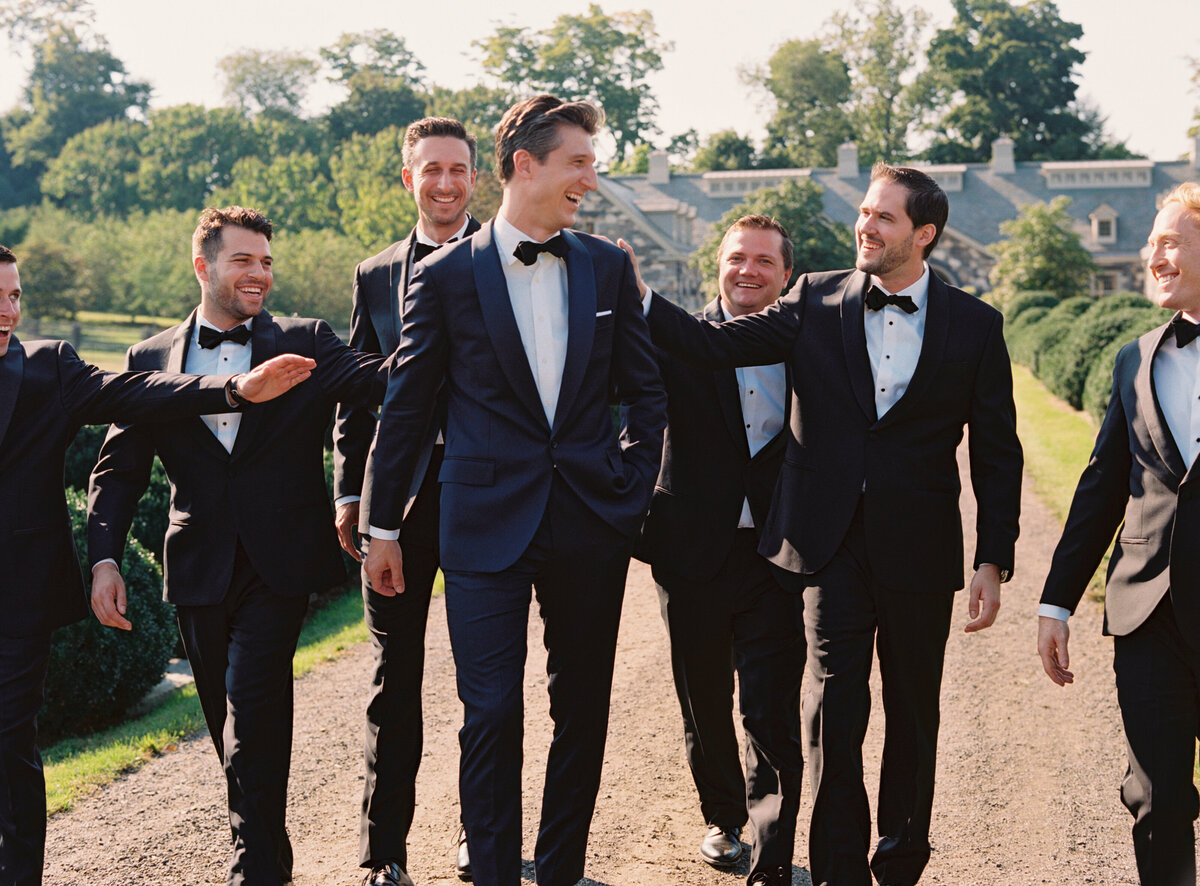 estate-wedding-navy-tux-groom-groomsmen