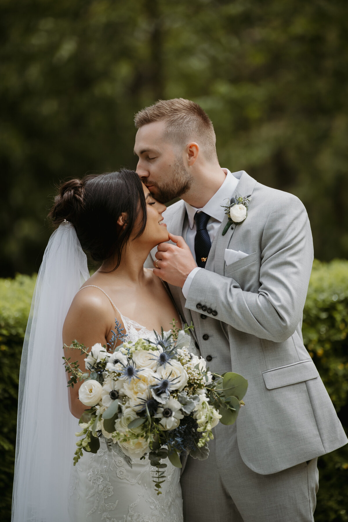 forehead kiss at alberta wedding