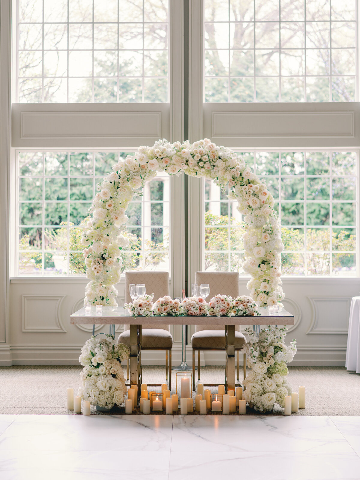 Luxury floral arch at expensive wedding at The Estate at Florentine Gardens