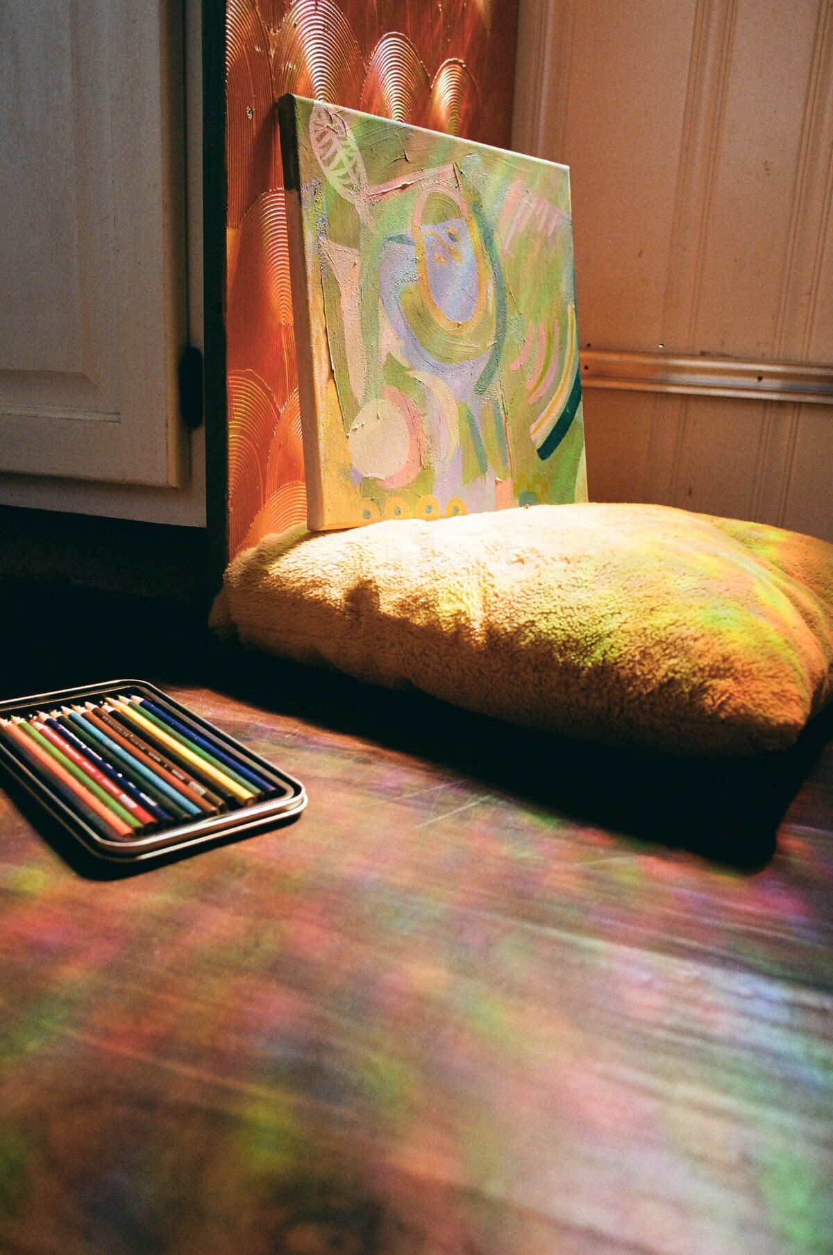 rainbows being cast on the floor featuring a new painting