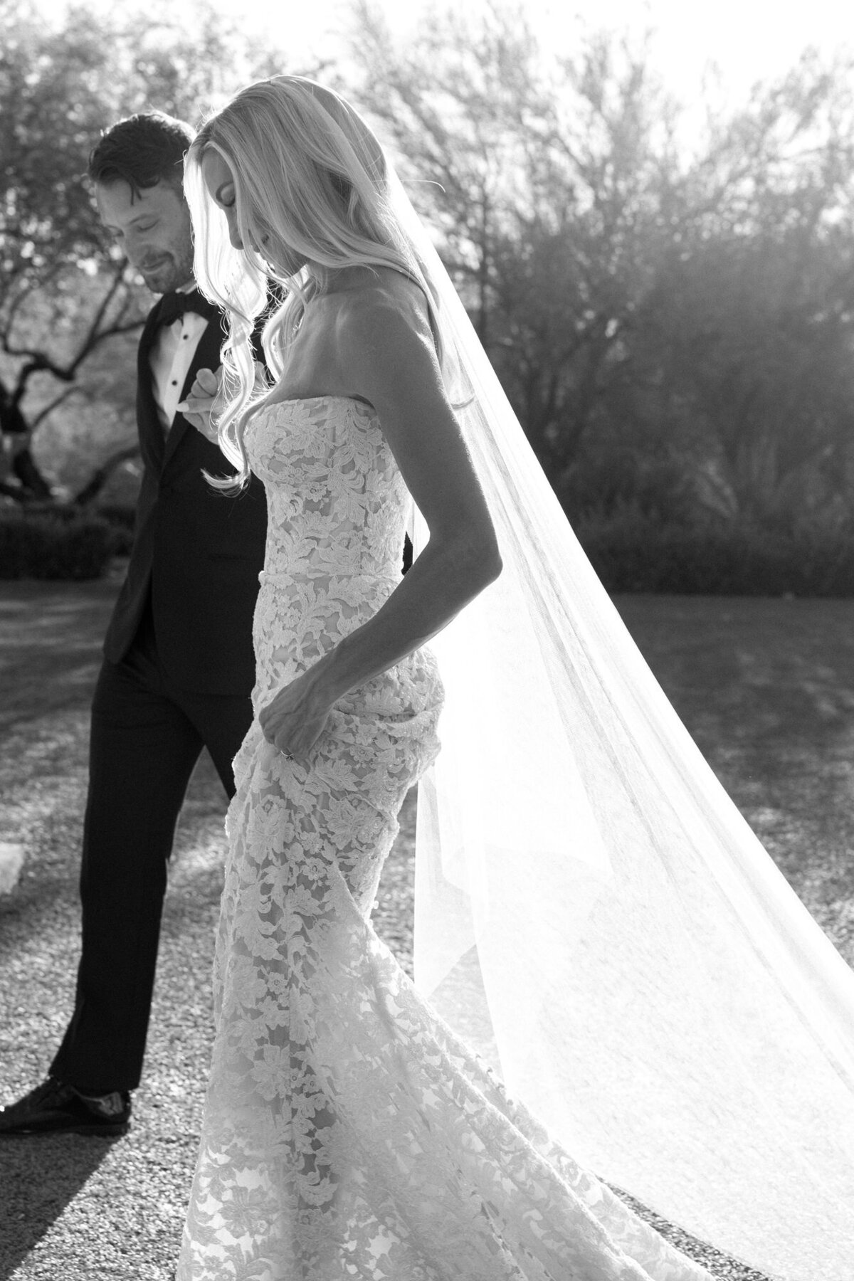 Bride and groom walking to alter at wedding ceremony in Paradise Valley, Arizona